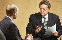 Al Bruhn discusses politics with Connecticut Attorney General Richard Blumental during a recent 